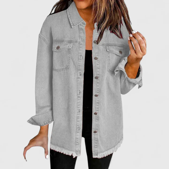 Women's dark blue oversized denim jacket with classic front pockets