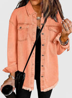 Women's black oversized denim jacket with classic front pockets detail
