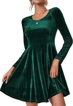 Women's green velvet A line skater dress with long sleeves and a flared hem