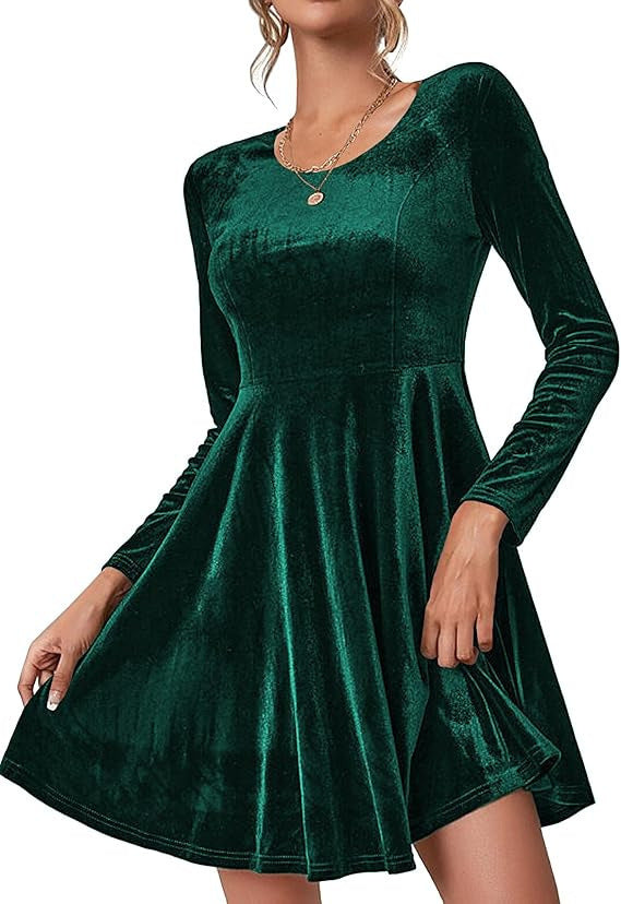 Women's green velvet A line skater dress with long sleeves and a flared hem