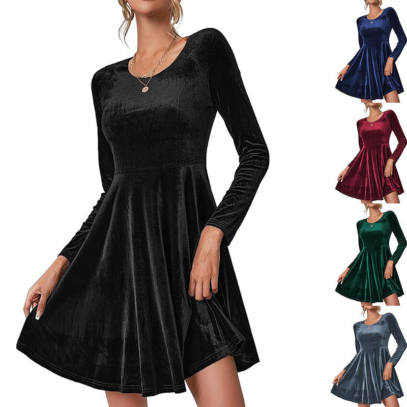 Women's velvet A line skater dress with long sleeves and a flared hem, side view