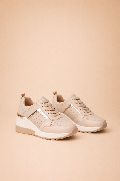 Women's white hidden wedge trainers with a breathable upper