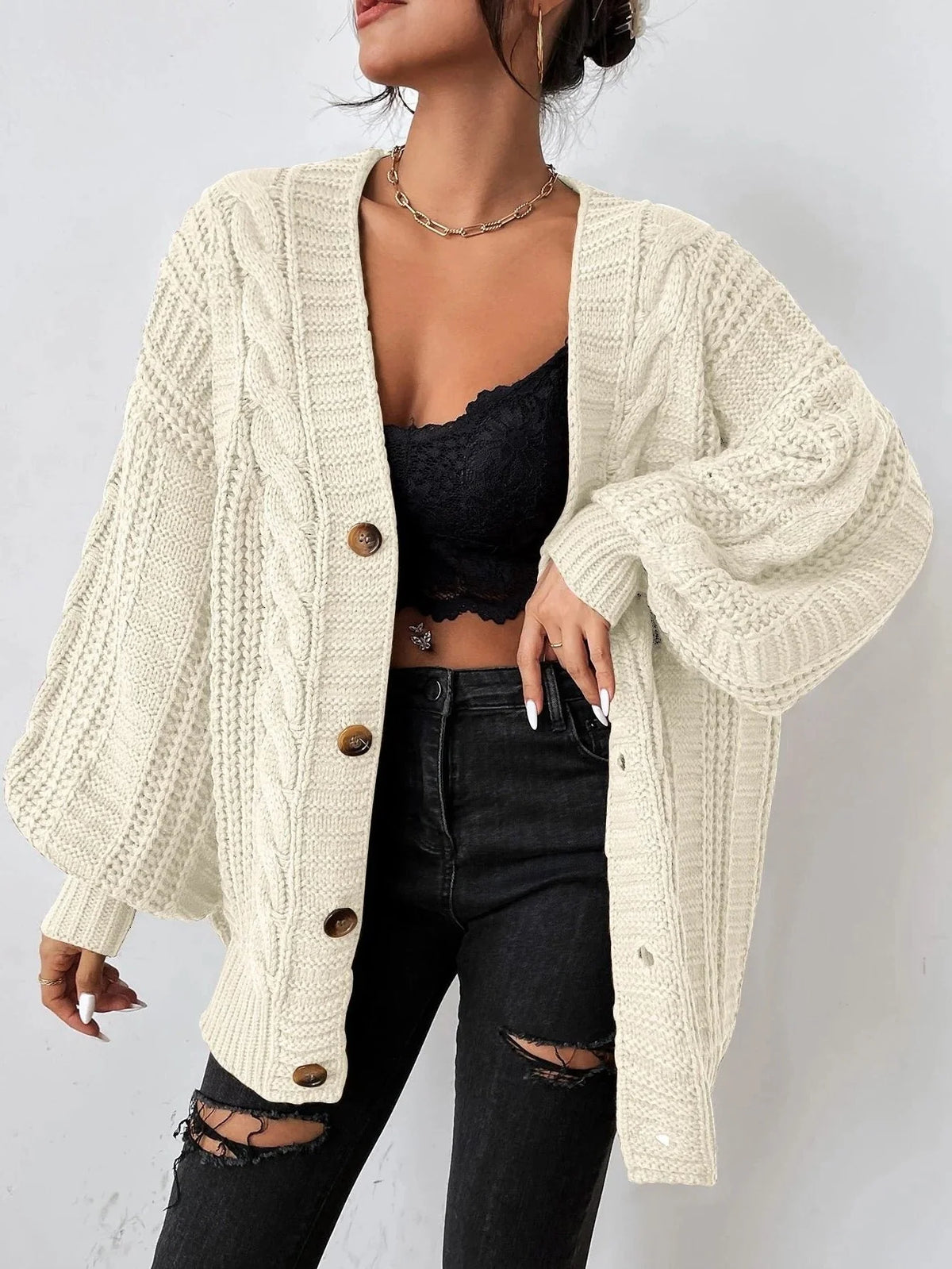 Women's cream chunky cable knit balloon sleeve cardigan