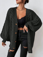 Women's black chunky cable knit balloon sleeve cardigan