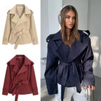 Oversized short trench coat with tie belt, product still life
