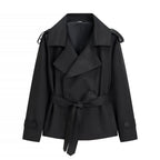 Oversized short trench coat with tie belt, product still life