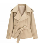 Oversized short trench coat with tie belt, product still life