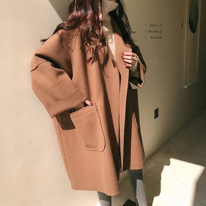 Women's coffee oversized wool blend trench coat with a tailored fit