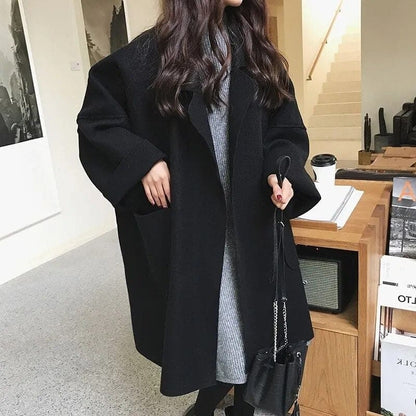 Women's coffee oversized wool blend trench coat with a tailored fit