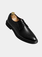 Black patent leather men's Derby shoes with lace-up front
