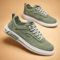 Green men's low-top street trainers with a lace-up front