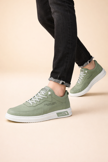 Green men's low-top street trainers with a lace-up front
