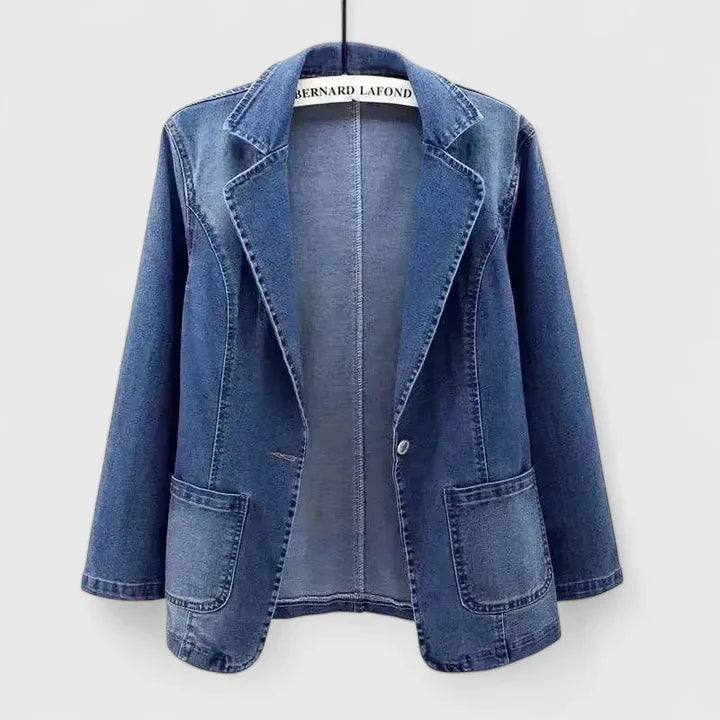 Women's denim blue straight cut denim jacket in a classic wash finish