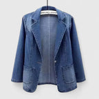 Women's denim blue straight cut denim jacket in a classic wash finish