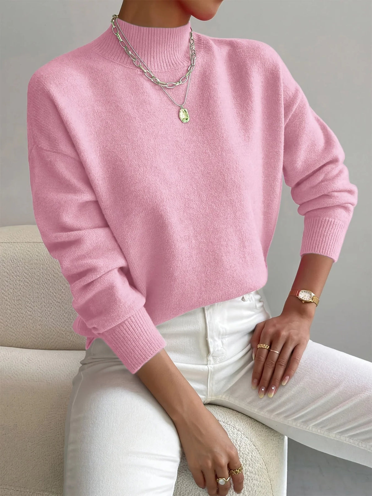 Women's light pink relaxed fit mock neck jumper