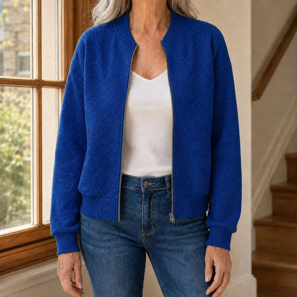 Women's royal blue quilted bomber jacket with ribbed trims