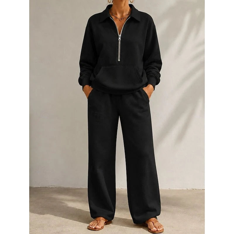 Women's black half zip tracksuit set with wide leg trousers