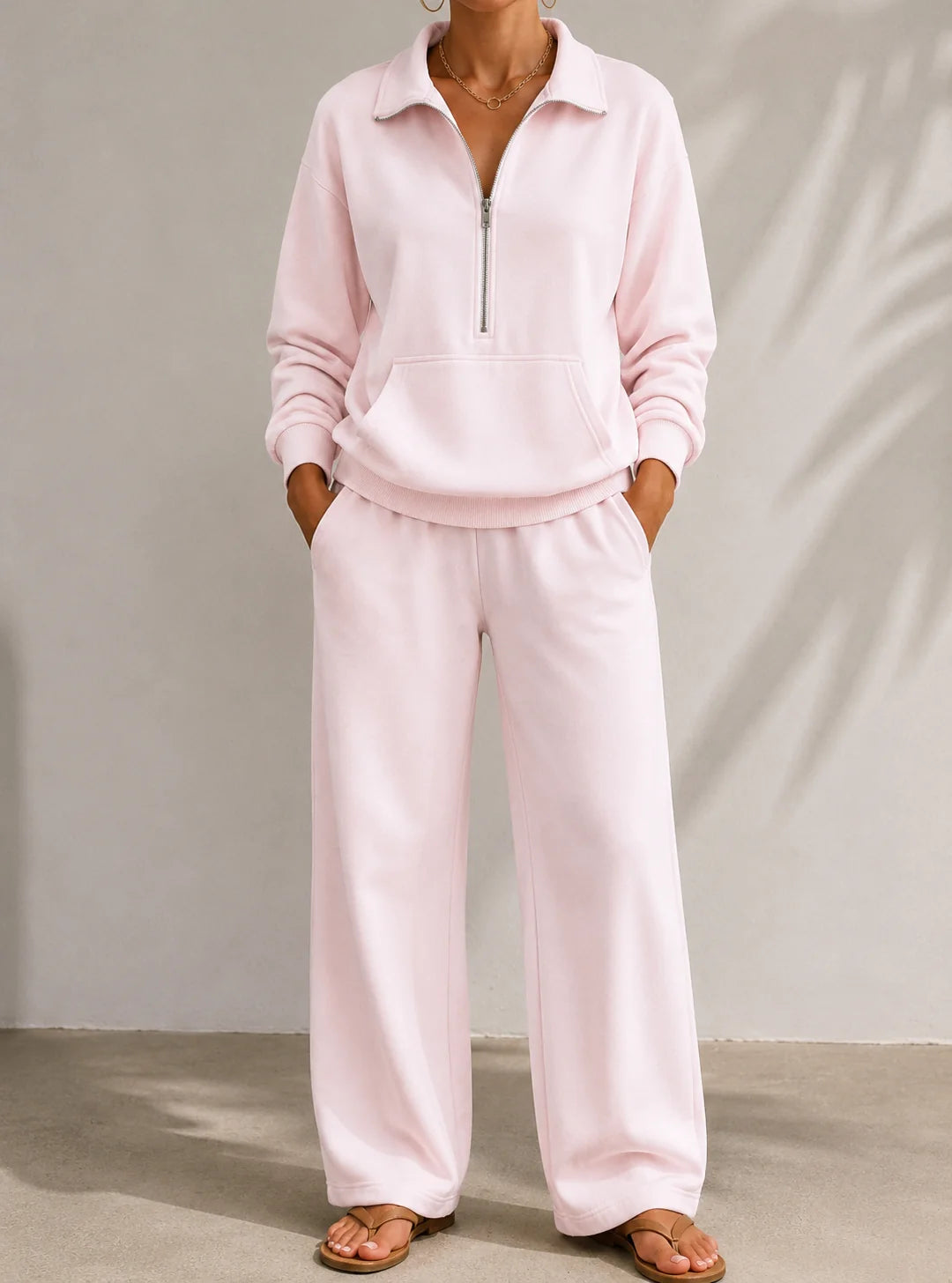 Women's pale pink half zip tracksuit set with wide leg trousers