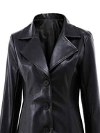 Black tailored mid-length coat with structured shoulders