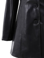 Black tailored mid-length coat with structured shoulders