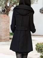 Women's double-breasted mid-length pea coat with notch lapel and front button closure