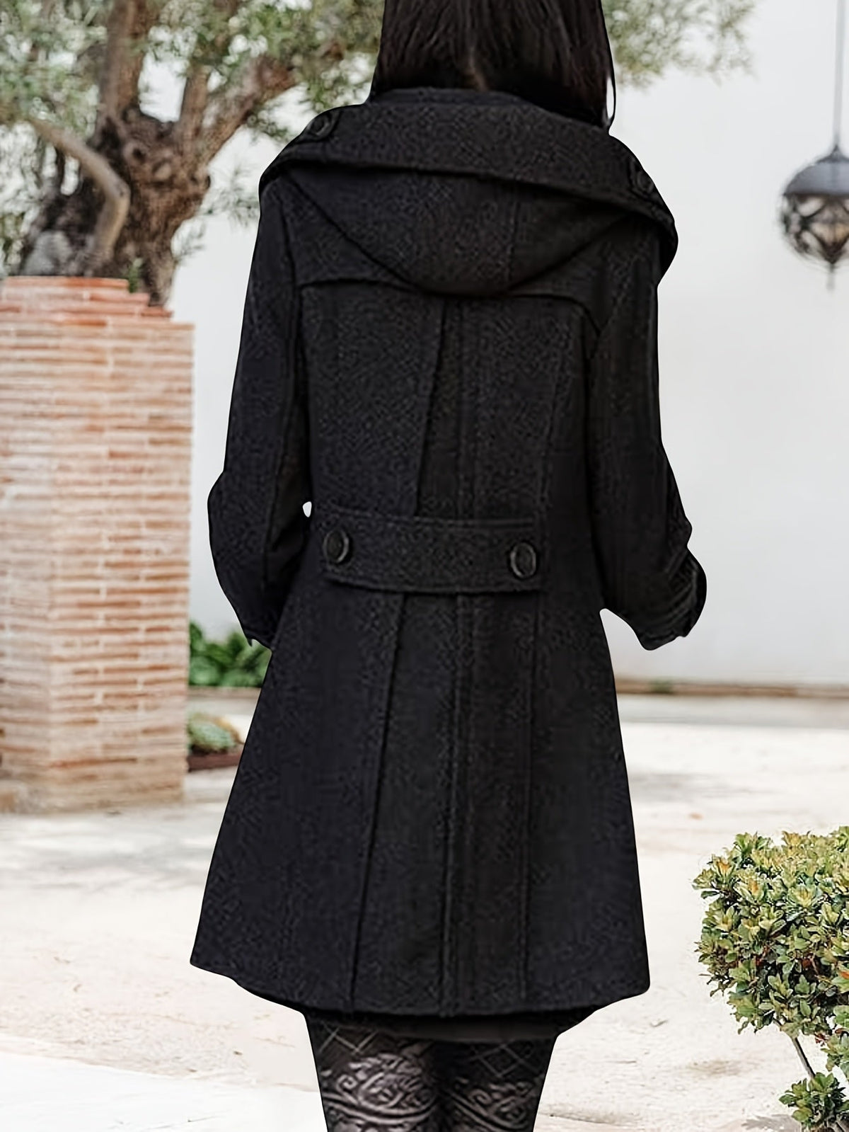 Women's double-breasted mid-length pea coat with notch lapel and front button closure