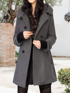 Women's double-breasted mid-length pea coat with notch lapel and front button closure