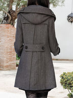 Women's double-breasted mid-length pea coat with notch lapel and front button closure