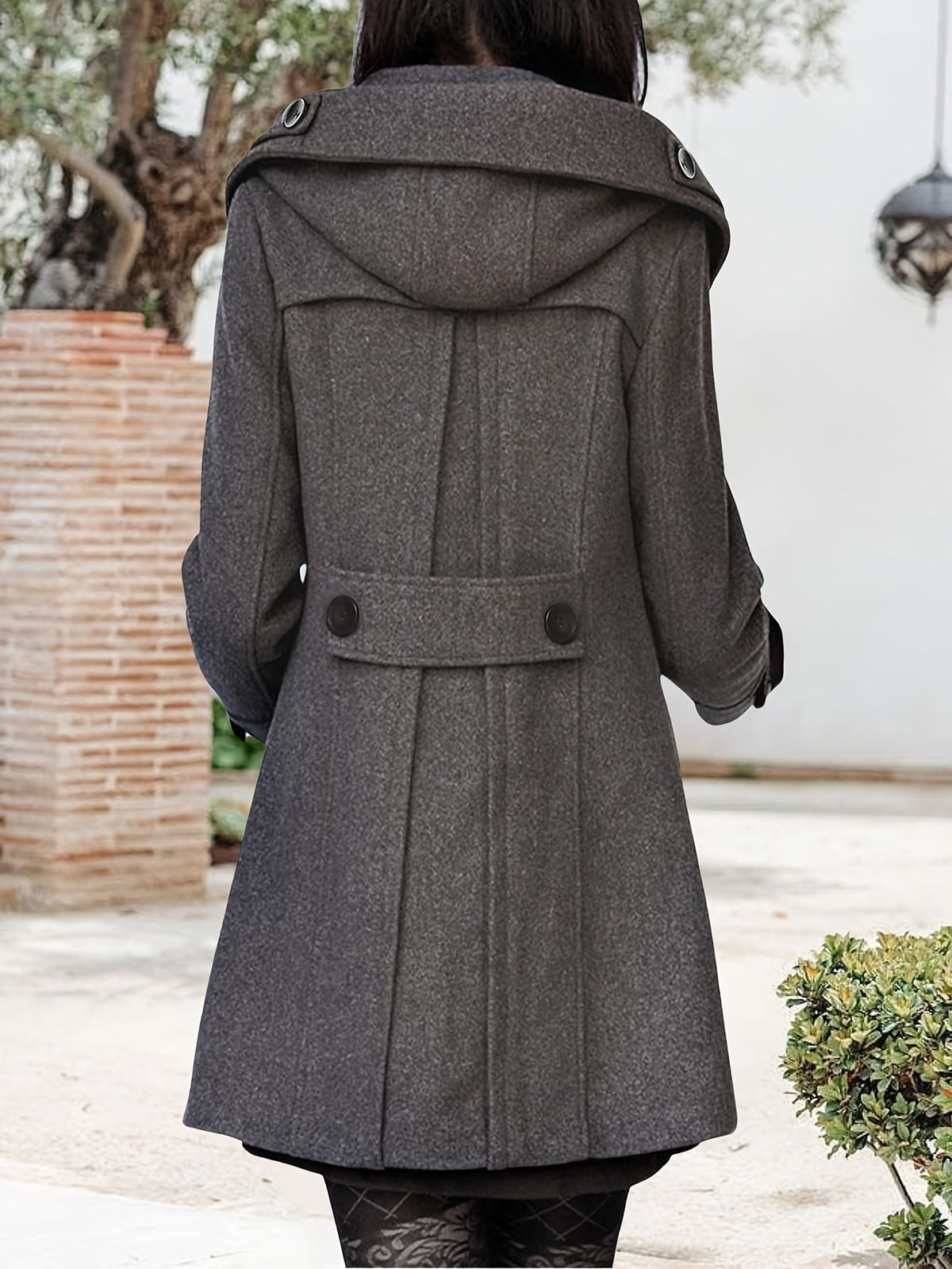 Women's double-breasted mid-length pea coat with notch lapel and front button closure