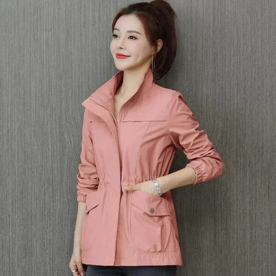 Waterproof cinched-waist jacket, side view