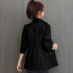 Close-up of cinched waist tie on waterproof jacket