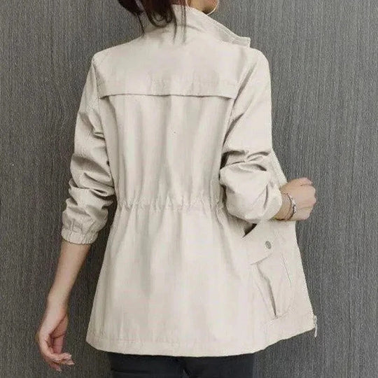 Close-up of zip and hood on waterproof jacket