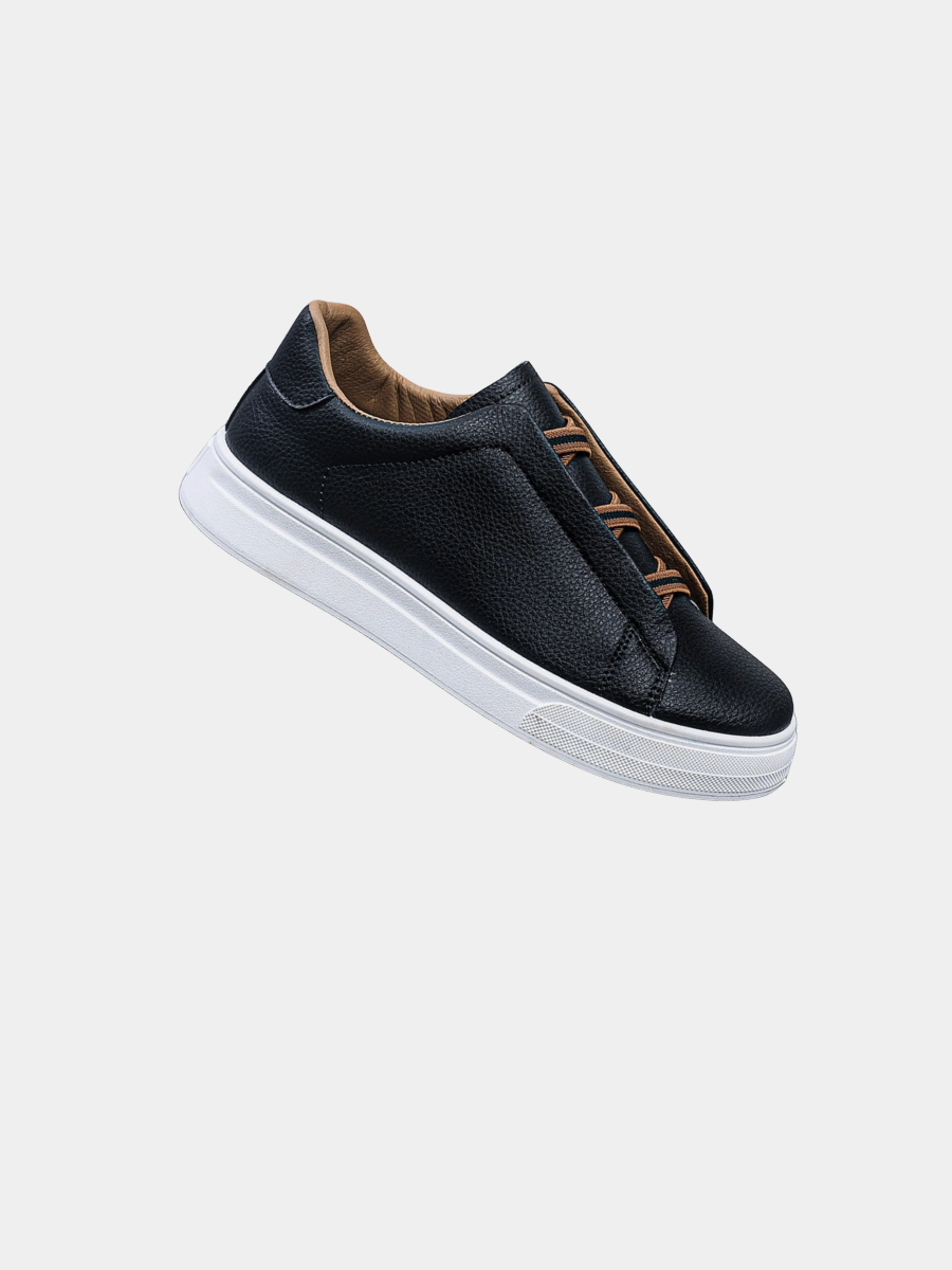 Slip-on trainers, product still life