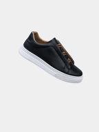 Slip-on trainers, product still life