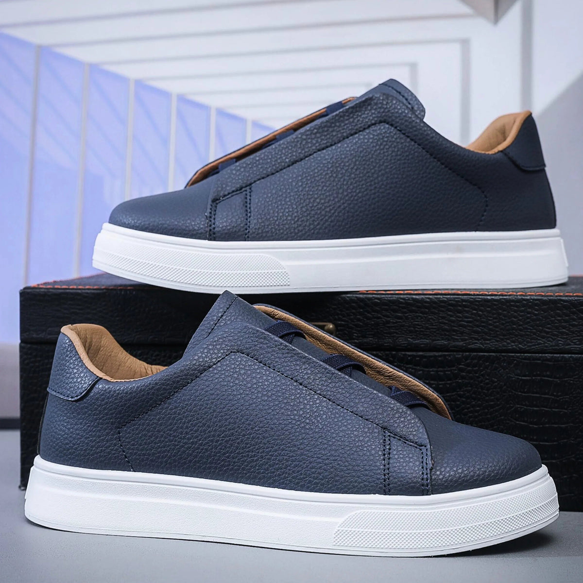 Slip-on trainers, product still life