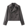 Short double-breasted trench coat with belt, product still life