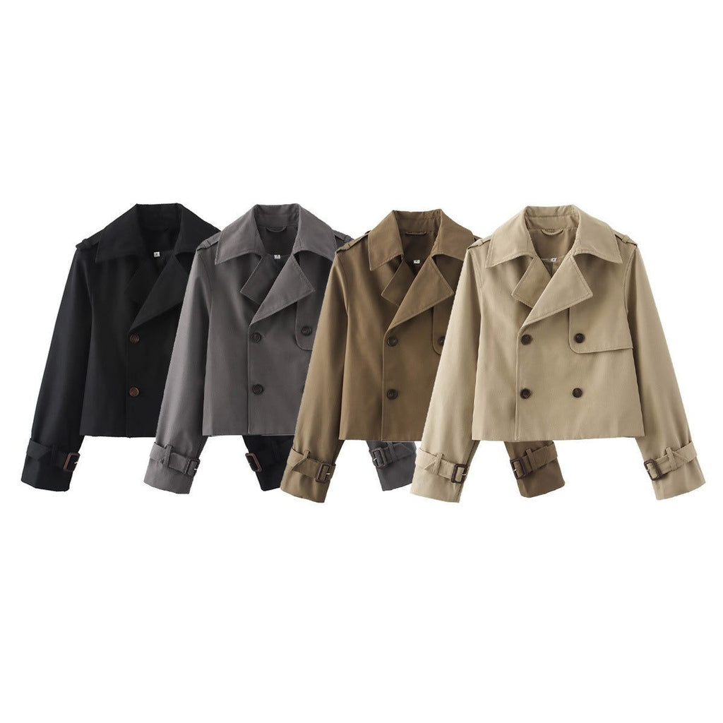 Short double-breasted trench coat with belt, product still life