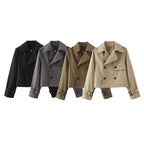 Short double-breasted trench coat with belt, product still life
