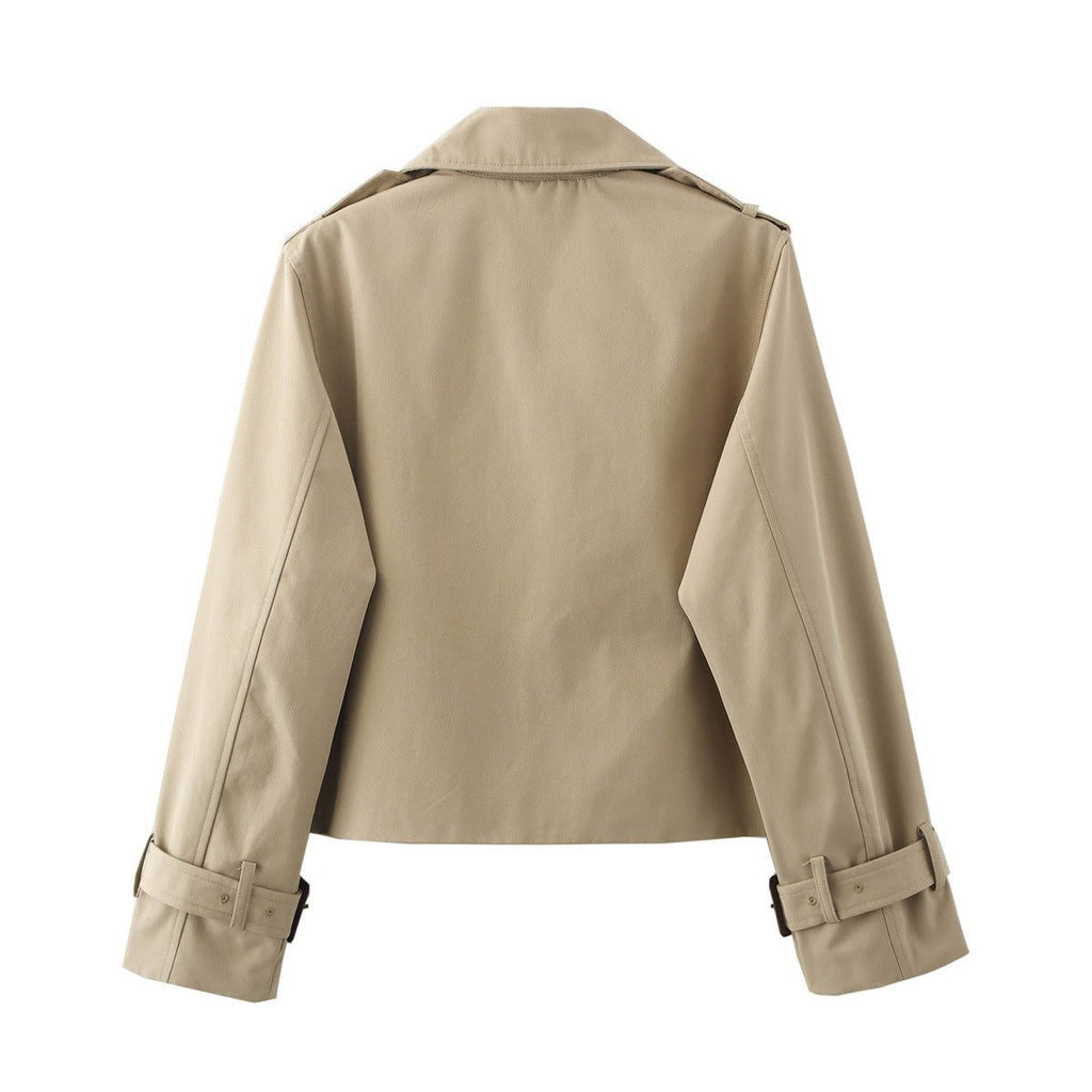 Short double-breasted trench coat with belt, product still life