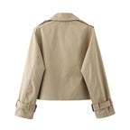Short double-breasted trench coat with belt, product still life
