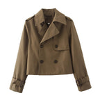 Short double-breasted trench coat with belt, product still life