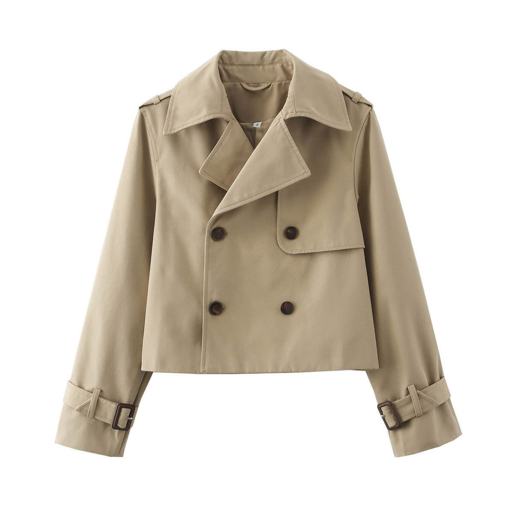 Short double-breasted trench coat with belt, product still life