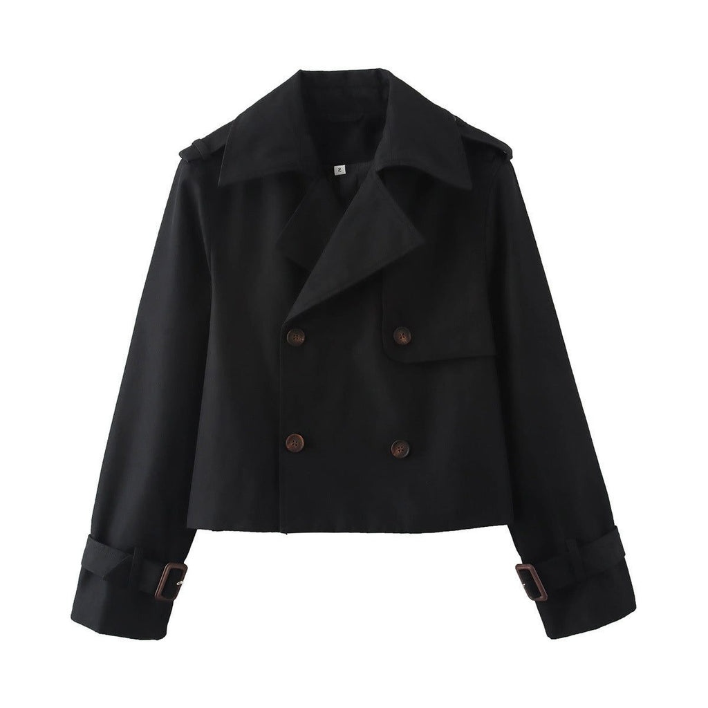 Short double-breasted trench coat with belt, product still life