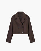 Short trench coat with double-breasted front, product still life