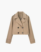 Short trench coat with double-breasted front, product still life