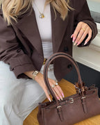 Short trench coat with double-breasted front, product still life