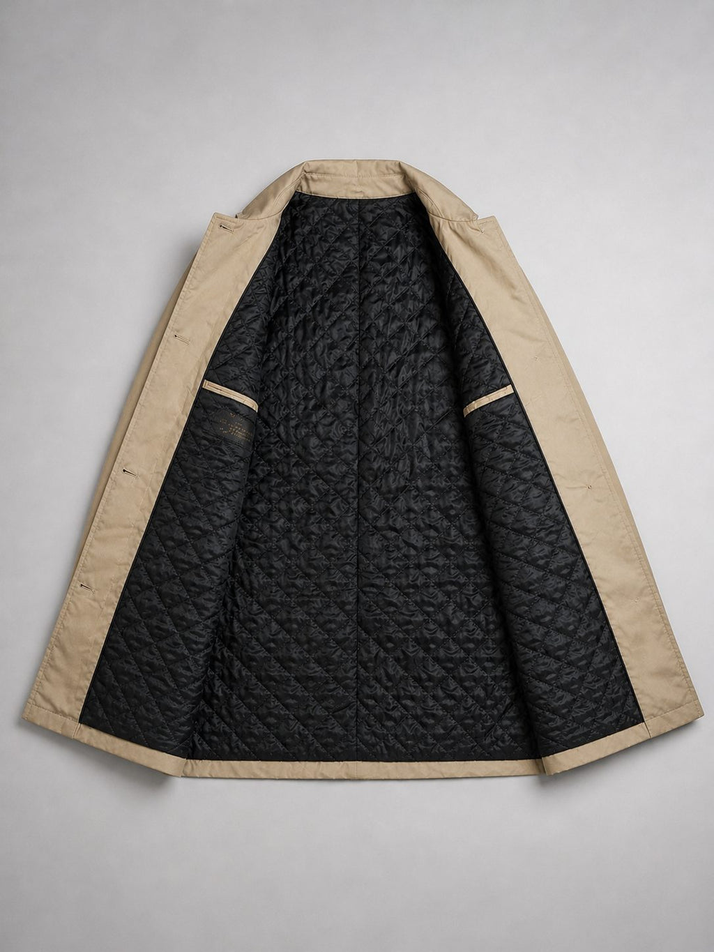 Single-breasted trench coat, product still life