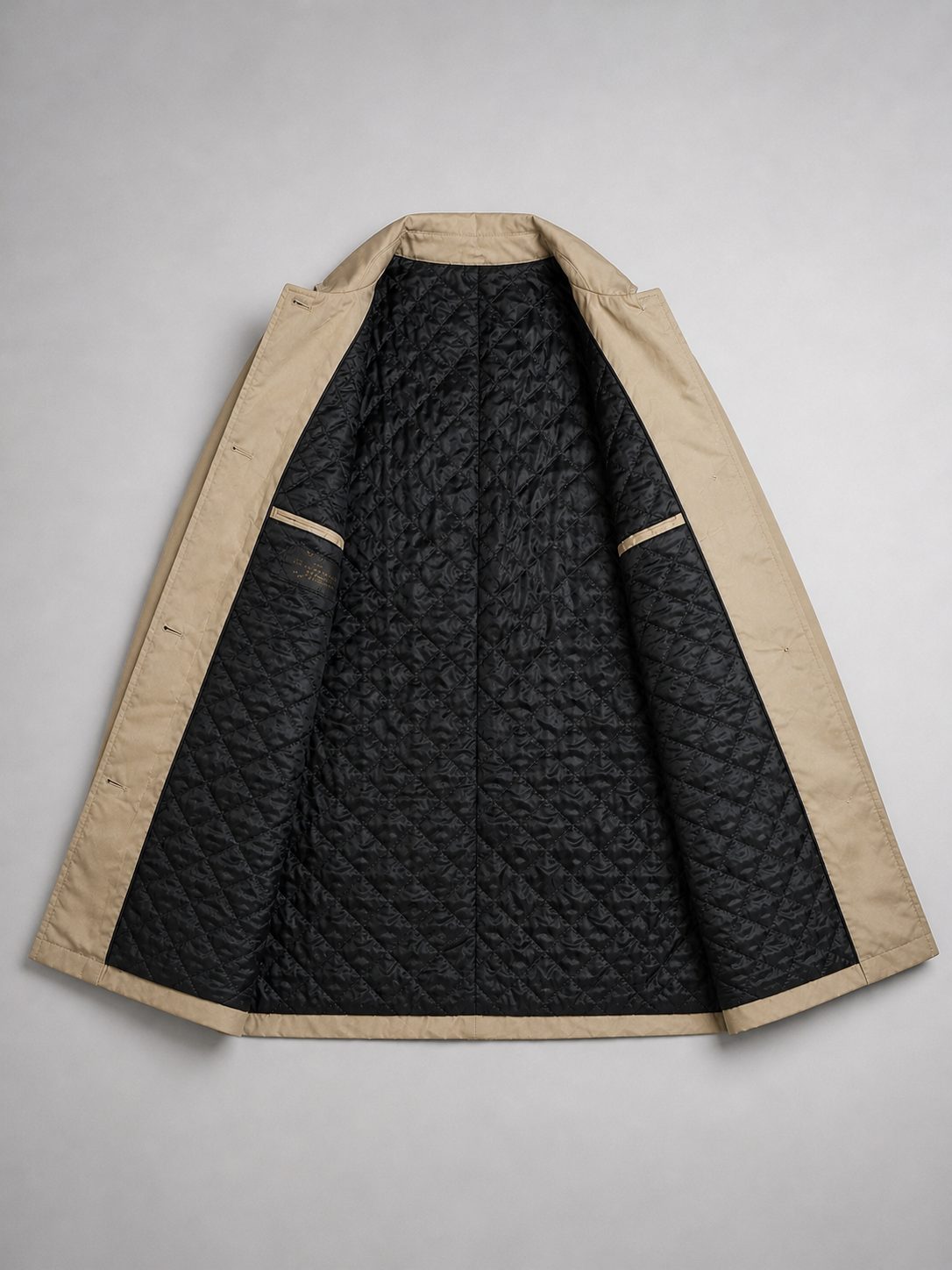 Single-breasted trench coat, product still life