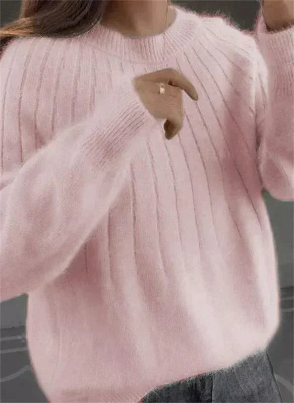 Pink lightweight cashmere jumper with a soft, breathable feel for autumn