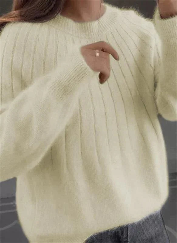 Pink lightweight cashmere jumper with a soft, breathable feel for autumn